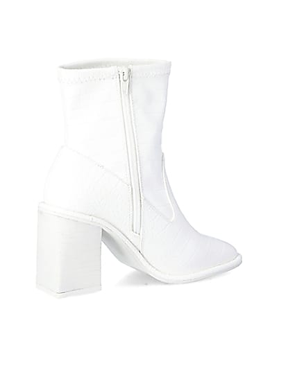 360 degree animation of product White croc embossed heeled ankle boots frame-13