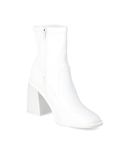 360 degree animation of product White croc embossed heeled ankle boots frame-18