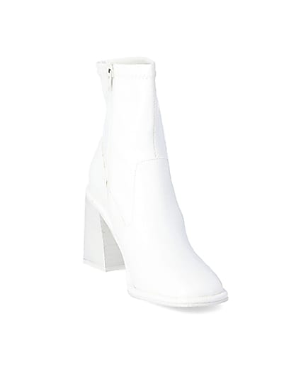 360 degree animation of product White croc embossed heeled ankle boots frame-19