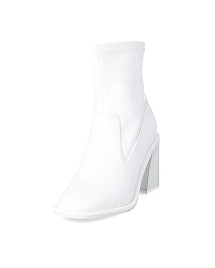 360 degree animation of product White croc embossed heeled ankle boots frame-23