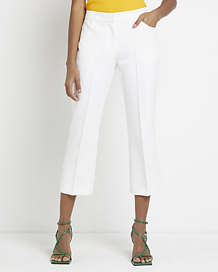 White cropped flared trousers