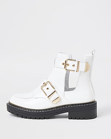 White cut out buckled boots