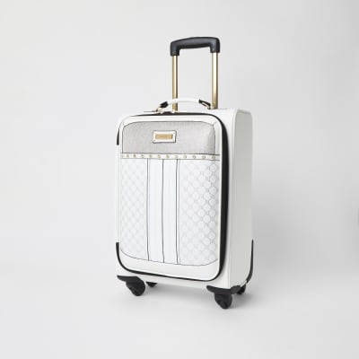 White diamante four wheel suitcase