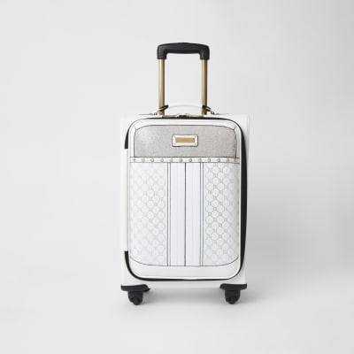 black four wheel suitcase