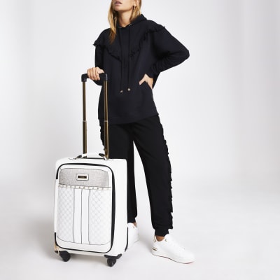 White diamante four wheel suitcase