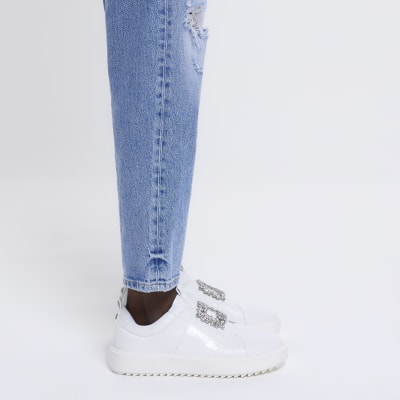 White embellished buckle trainers