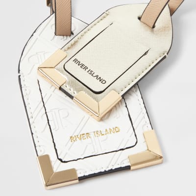 White embossed luggage tag set
