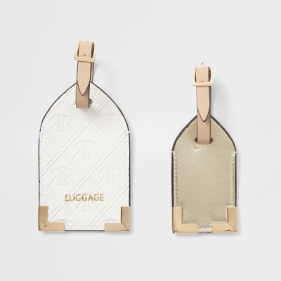 White embossed luggage tag set