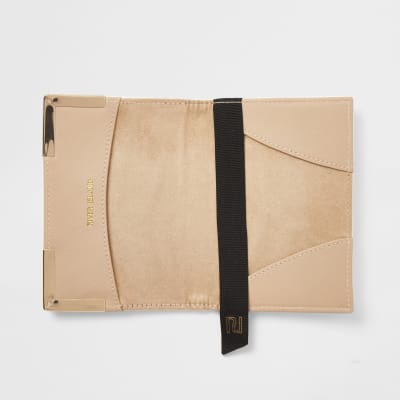 White embossed passport holder