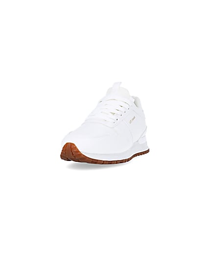 360 degree animation of product White embossed runner trainers frame-23