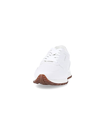 360 degree animation of product White embossed trainers frame-22