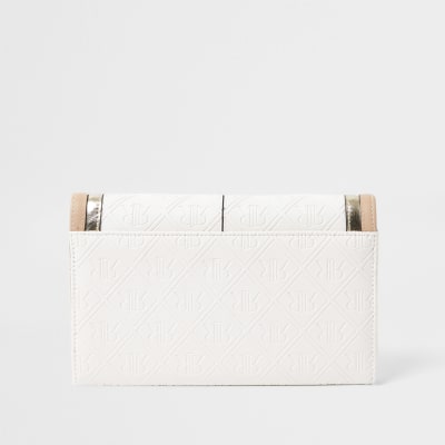 White embossed travel wallet