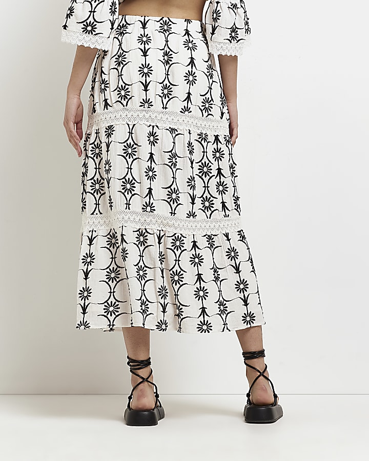 White embroidered floral midi skirt