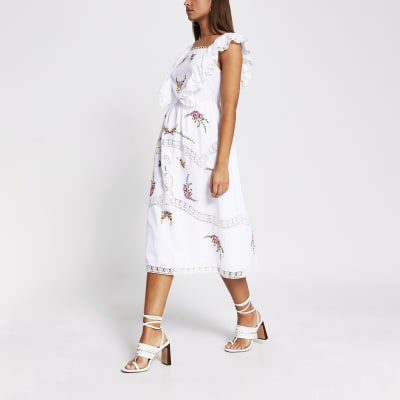 white midi embroidered dress