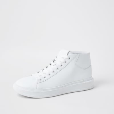 black mid top trainers