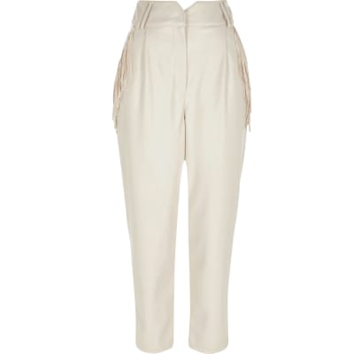 white fitted trousers