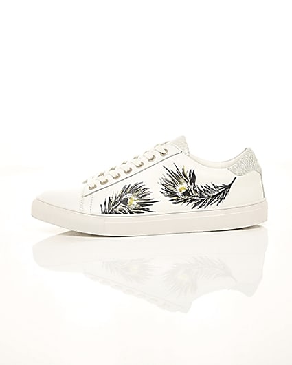 360 degree animation of product White feather print low top cupsole trainers frame-22