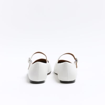 White flat ballet shoes