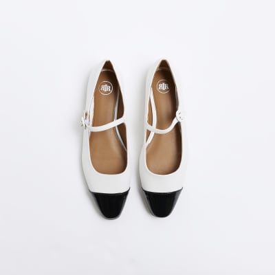 White flat ballet shoes