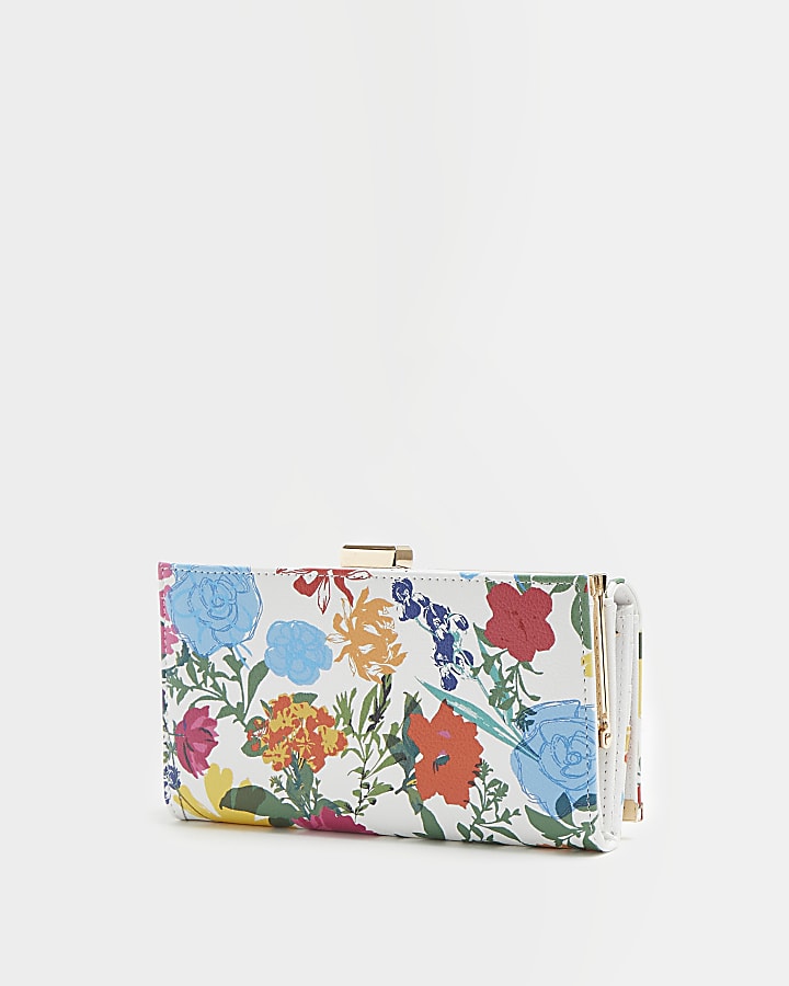 White floral quilted purse