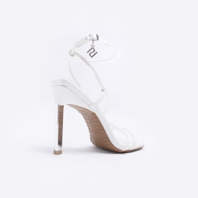White heeled sandals
