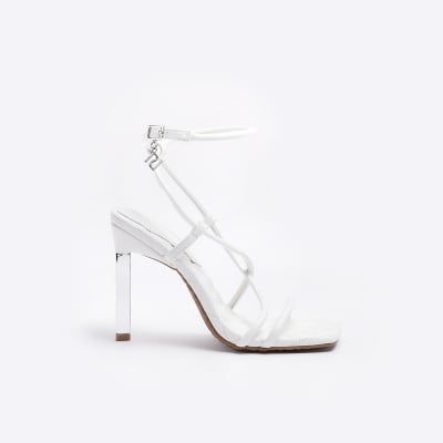 White heeled sandals