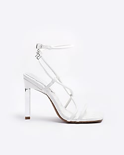 White heeled sandals