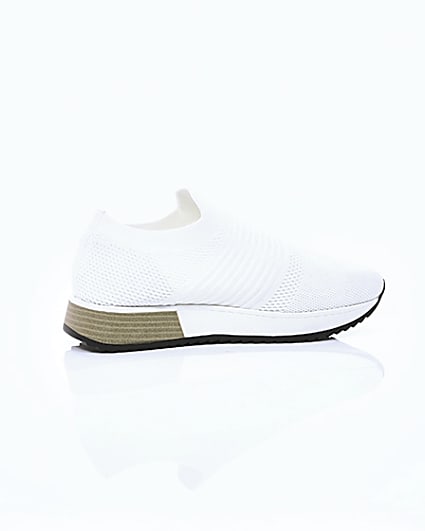 360 degree animation of product White knitted runner trainers frame-11