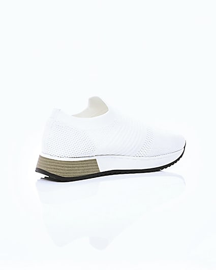 360 degree animation of product White knitted runner trainers frame-12