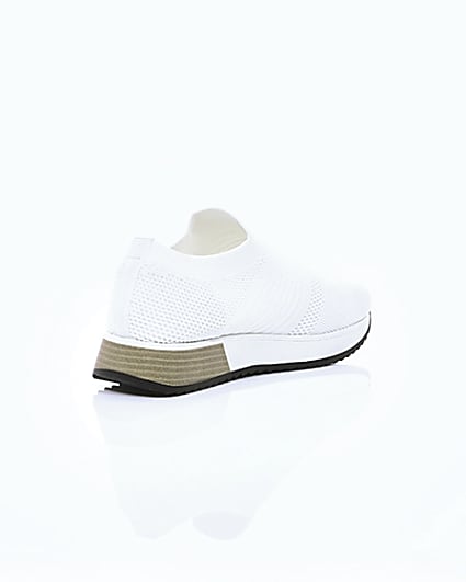 360 degree animation of product White knitted runner trainers frame-13