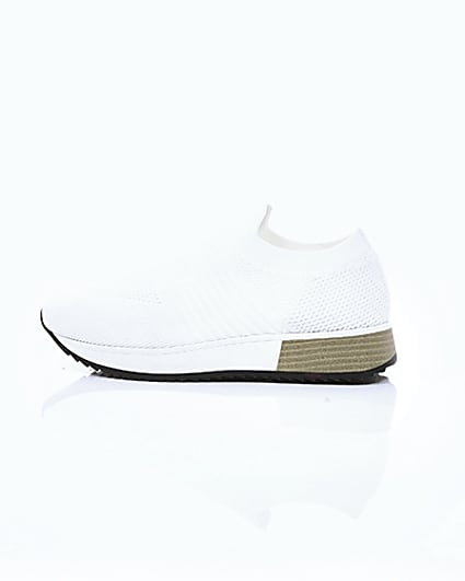 360 degree animation of product White knitted runner trainers frame-21