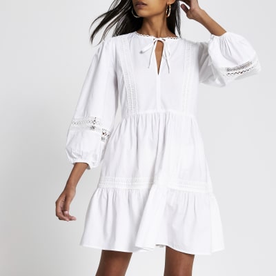 white smock dress long sleeve