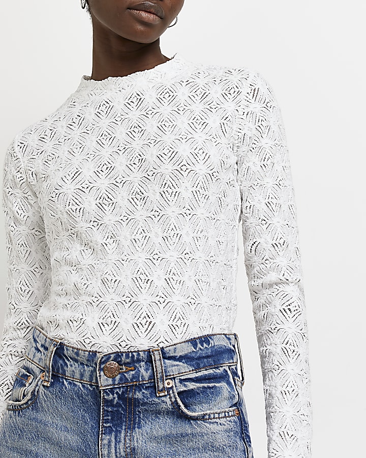 White lace textured long sleeve top