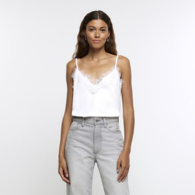 https://images.riverisland.com/is/image/RiverIsland/white-lace-trim-cami-top_903182_main