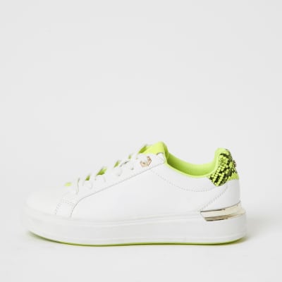 white and neon trainers