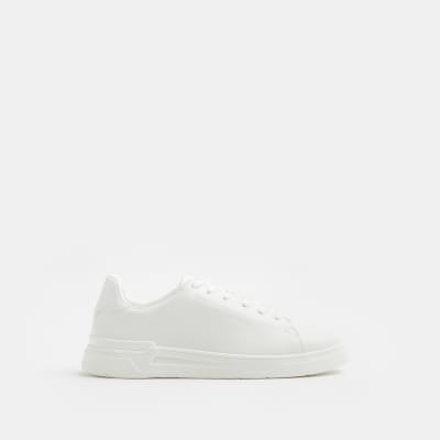 White lace up cupsole trainers