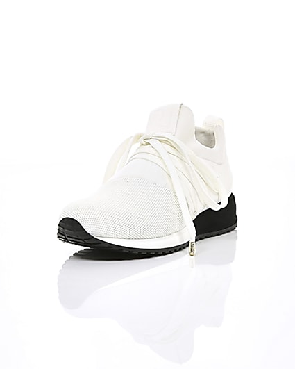 360 degree animation of product White lace-up runner trainers frame-1