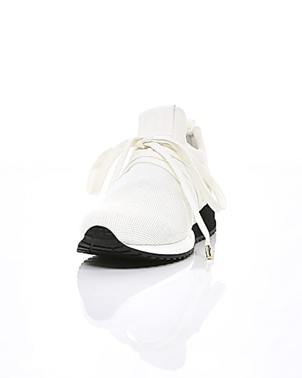 360 degree animation of product White lace-up runner trainers frame-2