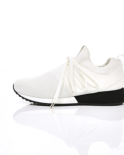 360 degree animation of product White lace-up runner trainers frame-21