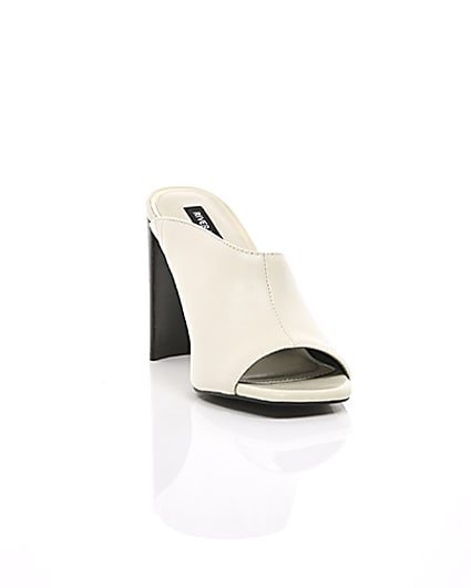 360 degree animation of product White leather asymmetric mules frame-5
