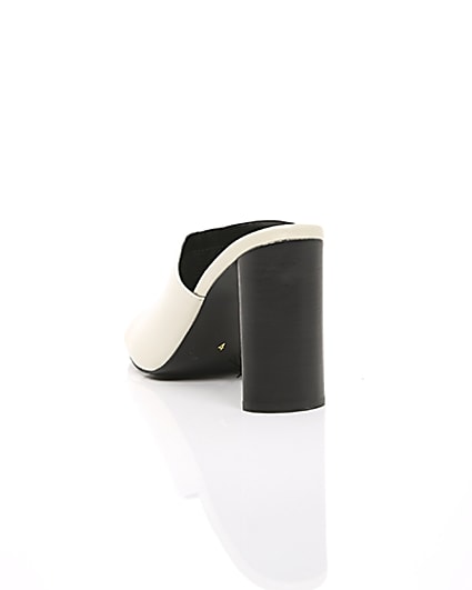360 degree animation of product White leather asymmetric mules frame-17