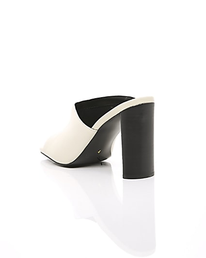 360 degree animation of product White leather asymmetric mules frame-18