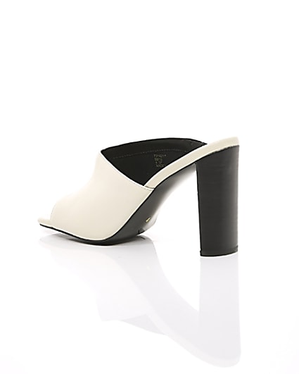 360 degree animation of product White leather asymmetric mules frame-19