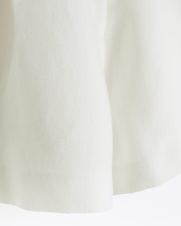 White linen blend button shorts
