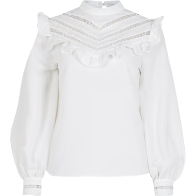 white long sleeve ruffle shirt