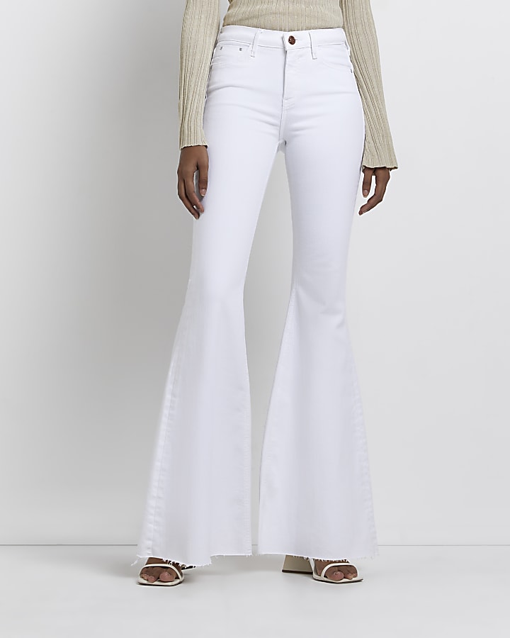 White mid rise ultra flared jeans
