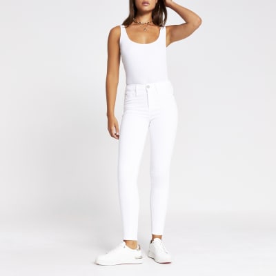 mid rise white skinny jeans