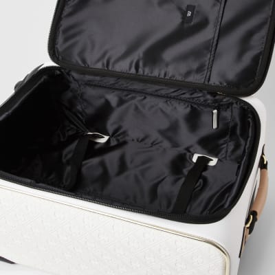 White monogram embossed suitcase