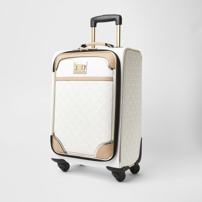 White monogram embossed suitcase