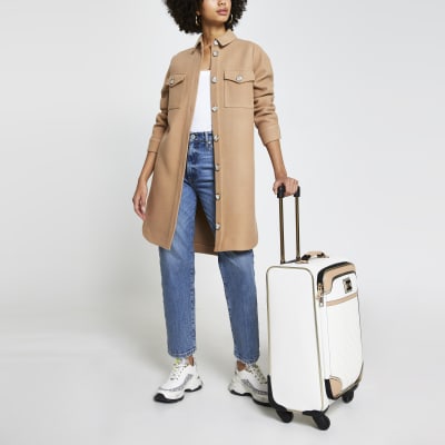 White monogram embossed suitcase